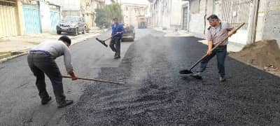 پایان عملیات هدایت آب های سطحی و آغازعملیات روكش آسفالت در منطقه سادات محله